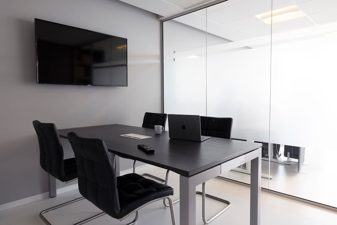 Event planner reviewing AV equipment setup in a Portland conference room