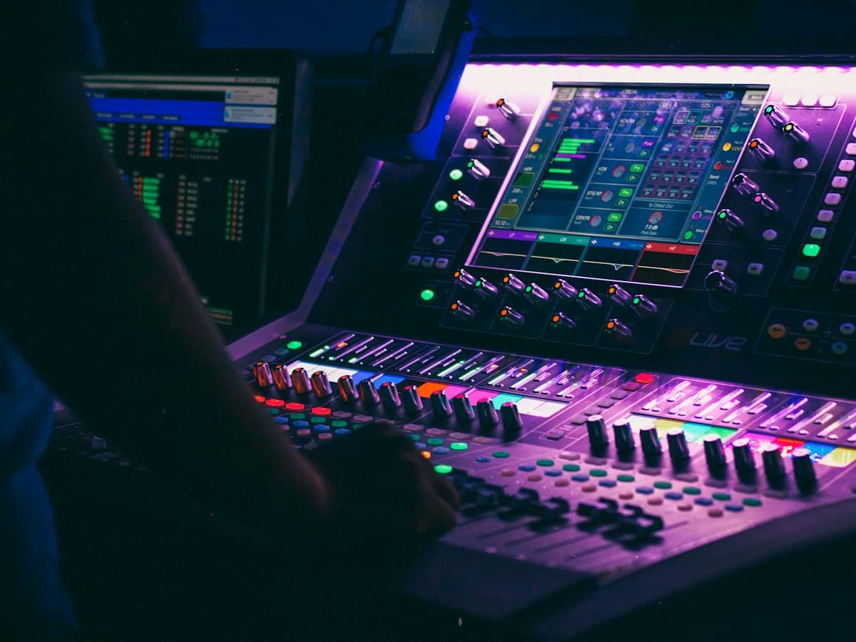 person playing the audio controller - EventGear PDX