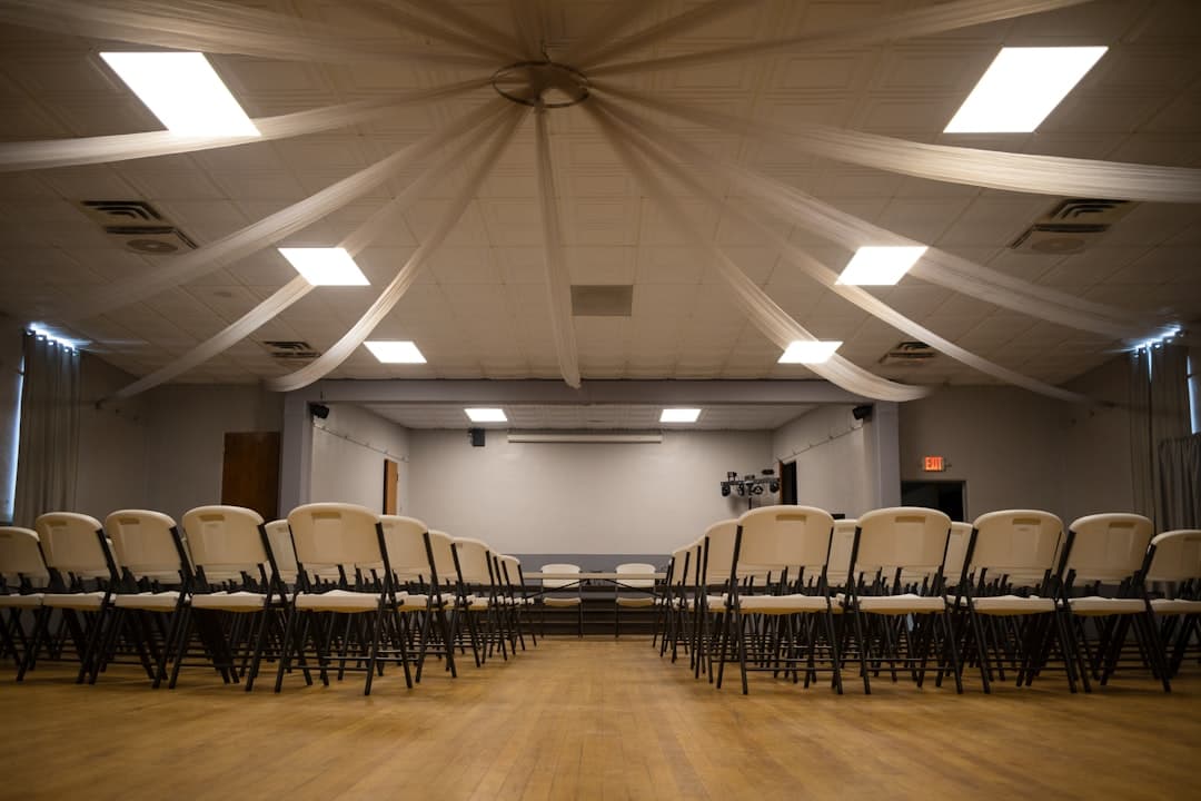 AV equipment setup at a Portland event venue with projector screen and speaker system