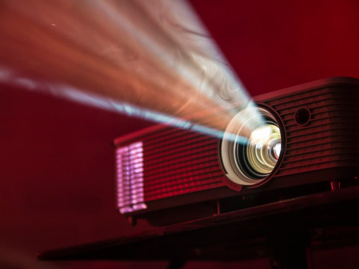 turned on LED projector on table - EventGear PDX