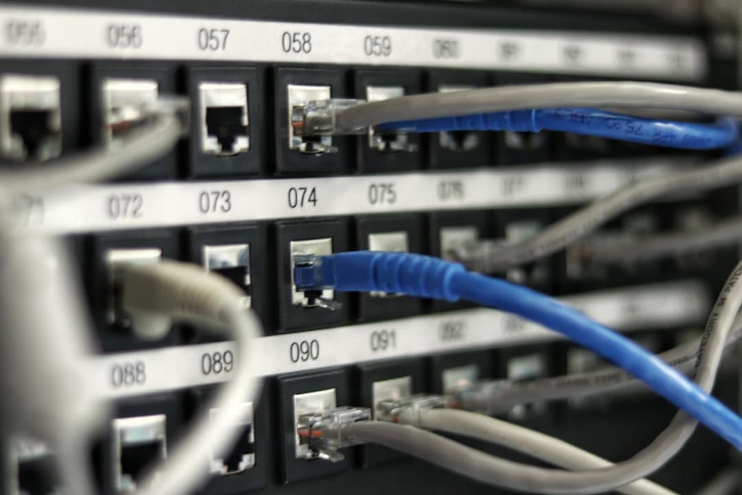 Close-up of projector input panel showing AV, HDMI, and VGA ports labeled