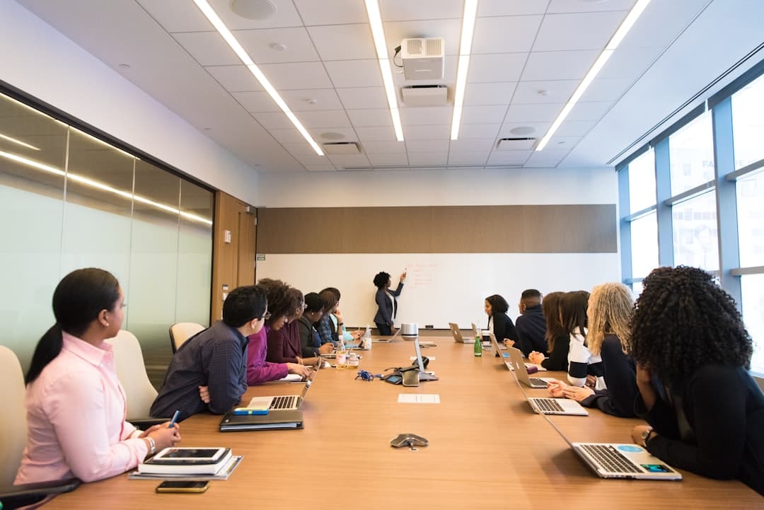 Professional boardroom setup with projection screen and conference table in a Trophy Club venue