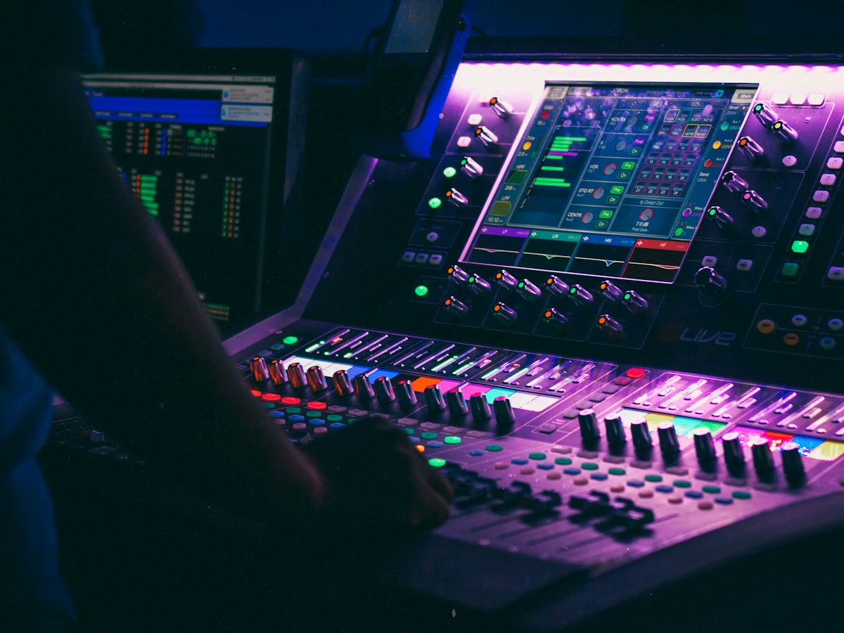 person playing the audio controller - EventGear PDX