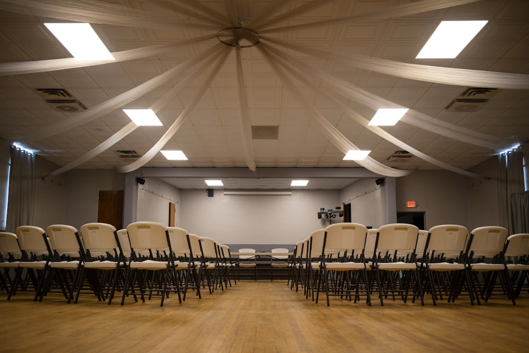 AV equipment setup at a Portland event venue with projector screen and speaker system